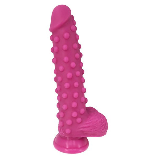 pink silicone dildo with textured design for fantasy play
