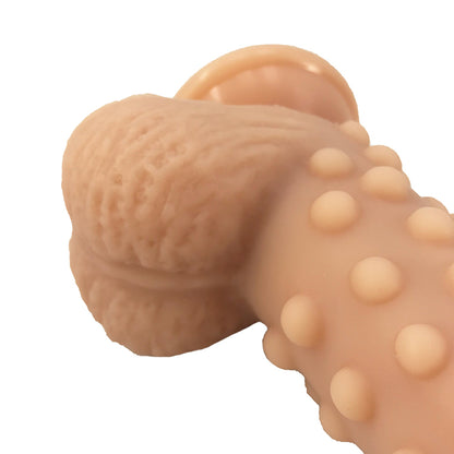 Beige silicone dildo with textured design for fantasy play